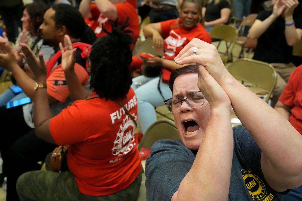 Volkswagen worker Stephanie Romack celebrates after a vote to join the United Auto Workers passes Friday in Chattanooga, Tenn. (George Walker IV/AP)